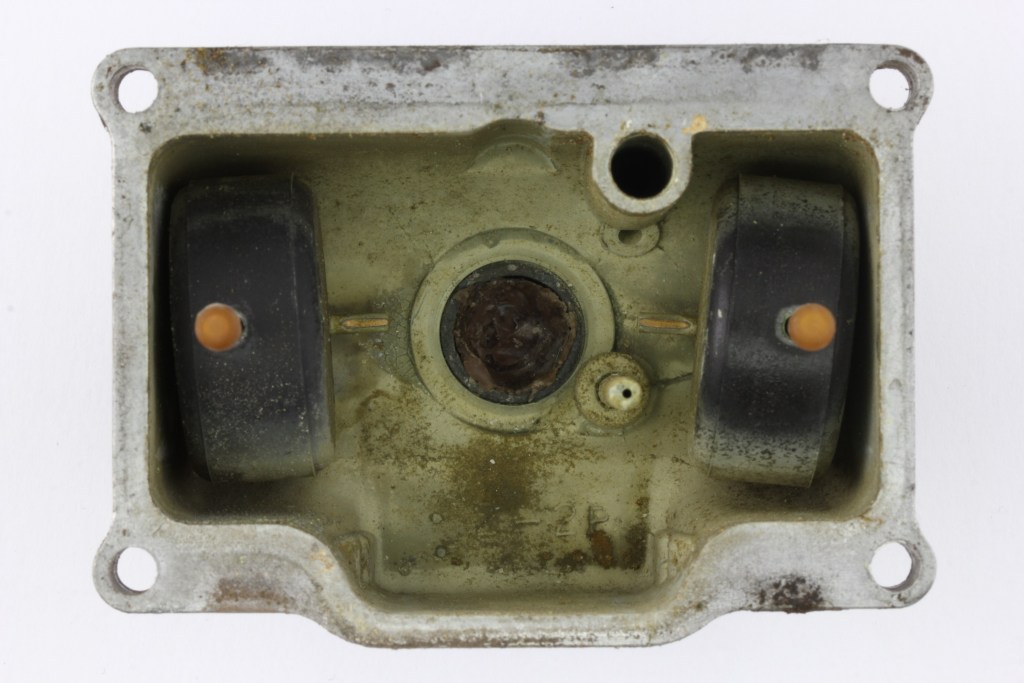Deposits and residue in carburetor bowl